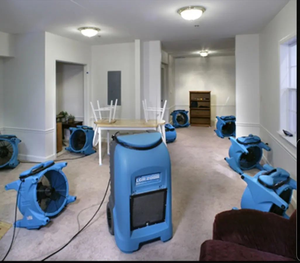 Air movers and dehumidifier setup for Water Extraction & Removal in Liberty